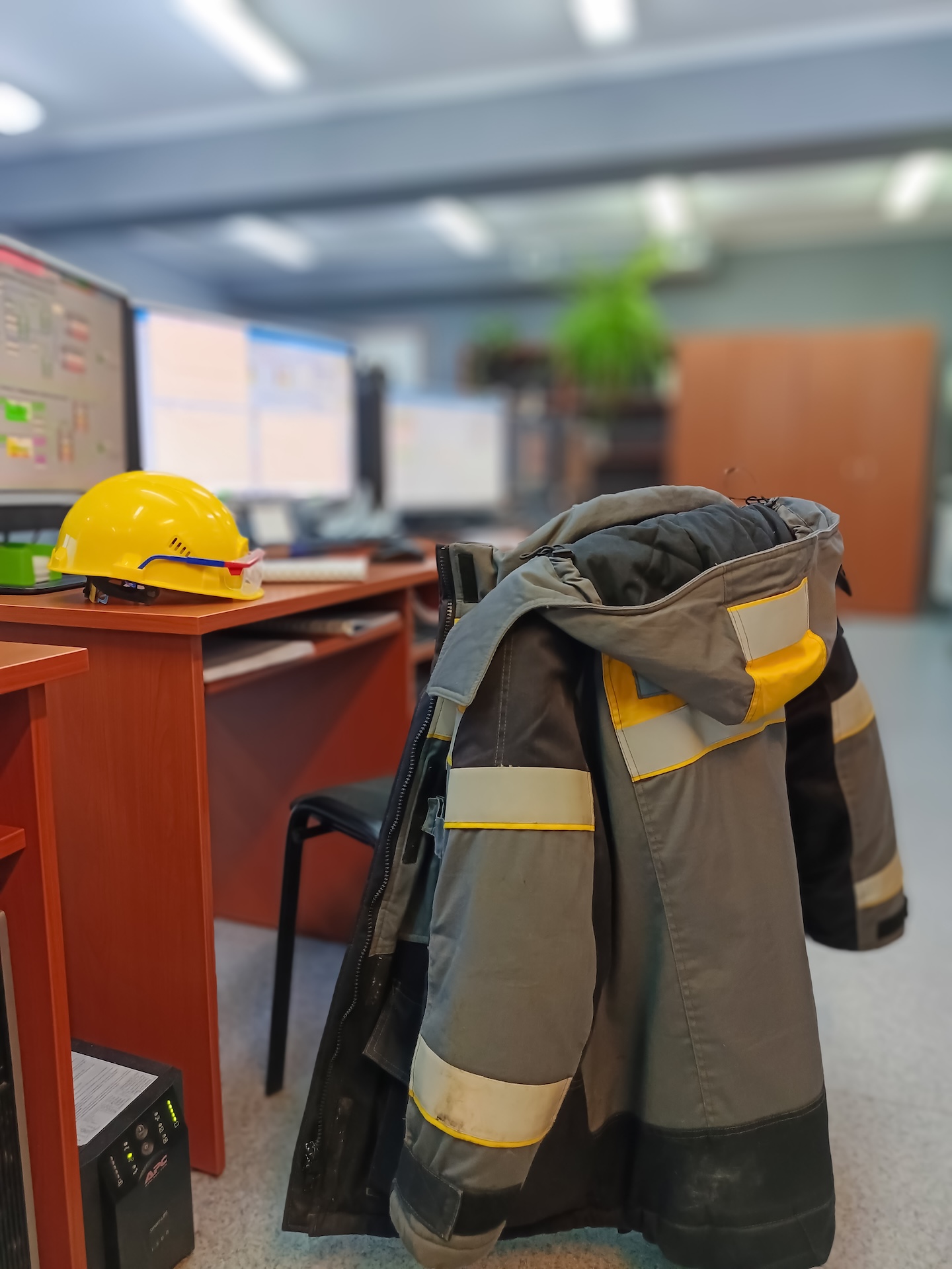 engineers yellow work clothes helmet hang back chair office near com